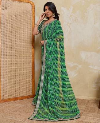 Glamorous green georgette bandhej print with embroidery work lace border saree with mono banglory silk blouse 3