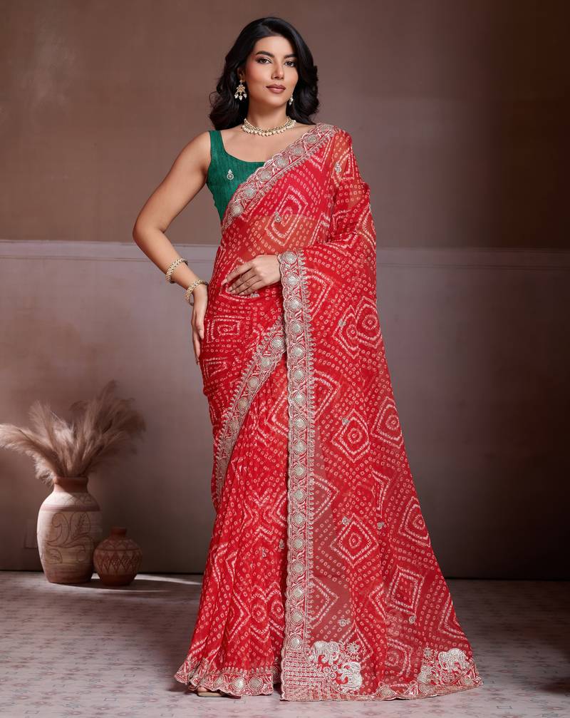Delightfully red georgette bandhej print with cutwork lace border saree with mono banglory silk blouse