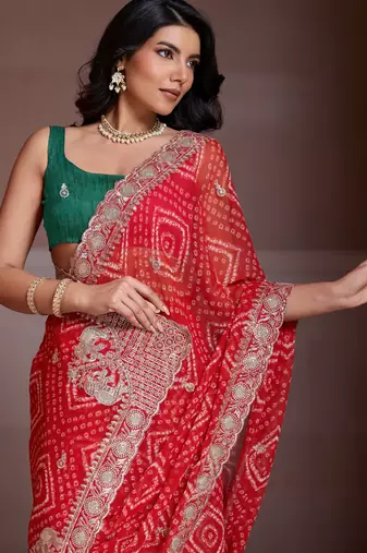Delightfully red georgette bandhej print with cutwork lace border saree with mono banglory silk blouse