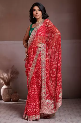 Delightfully red georgette bandhej print with cutwork lace border saree with mono banglory silk blouse