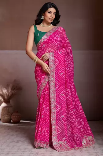 Attractive pink georgette bandhej print with cutwork lace border saree with mono banglory silk blouse