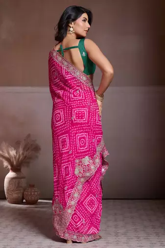 Attractive pink georgette bandhej print with cutwork lace border saree with mono banglory silk blouse