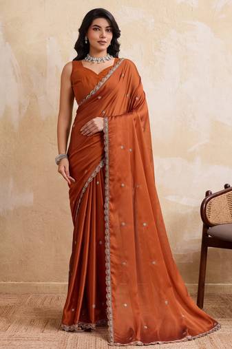 Engaging rust orange rangoli silk embroidery cutwork work lace border saree with rangoli silk blouse
