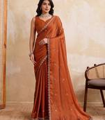 Engaging rust orange rangoli silk embroidery cutwork work lace border saree with rangoli silk blouse