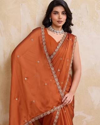 Engaging rust orange rangoli silk embroidery cutwork work lace border saree with rangoli silk blouse 2