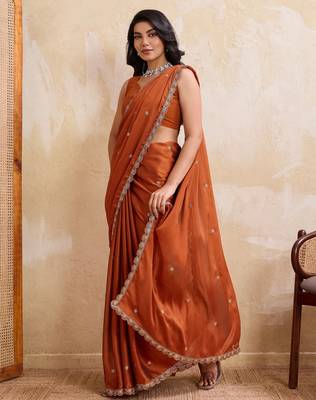 Engaging rust orange rangoli silk embroidery cutwork work lace border saree with rangoli silk blouse 3