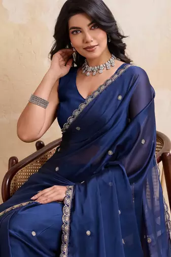 Dazzling navy blue rangoli silk embroidery cutwork work lace border saree with rangoli silk blouse