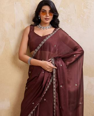 Alluring brown rangoli silk embroidery cutwork work lace border saree with rangoli silk blouse 2