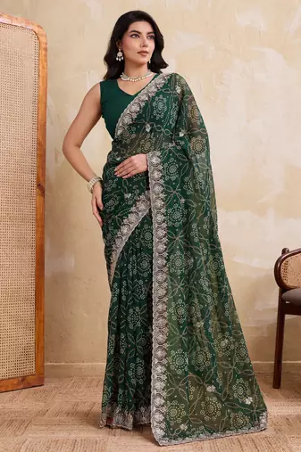 Ravishing green georgette bandhej print with cutwork lace border saree with mono banglory silk blouse