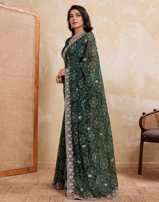 Ravishing green georgette bandhej print with cutwork lace border saree with mono banglory silk blouse 3