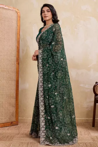Ravishing green georgette bandhej print with cutwork lace border saree with mono banglory silk blouse