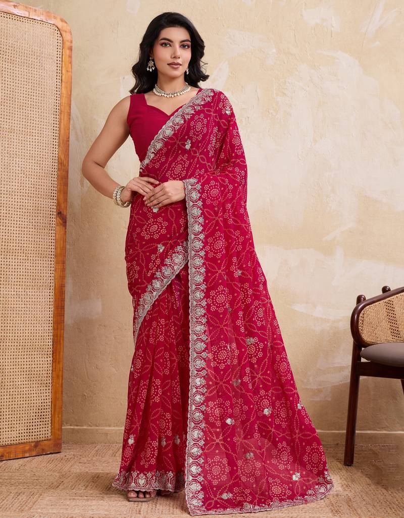 Irresistible pink georgette bandhej print with cutwork lace border saree with mono banglory silk blouse