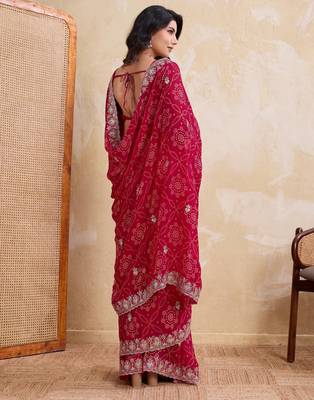 Irresistible pink georgette bandhej print with cutwork lace border saree with mono banglory silk blouse 4