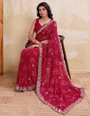 Irresistible pink georgette bandhej print with cutwork lace border saree with mono banglory silk blouse 5