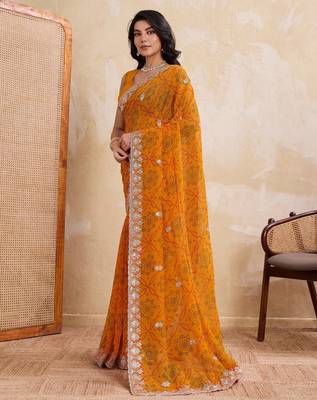 Spellbinding yellow georgette bandhej print with cutwork lace border saree with mono banglory silk blouse 3