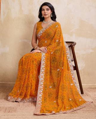 Spellbinding yellow georgette bandhej print with cutwork lace border saree with mono banglory silk blouse 5