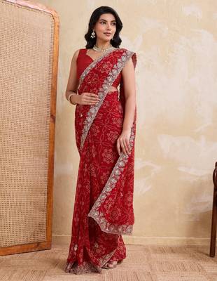 Entrancing red georgette bandhej print with cutwork lace border saree with mono banglory silk blouse 3