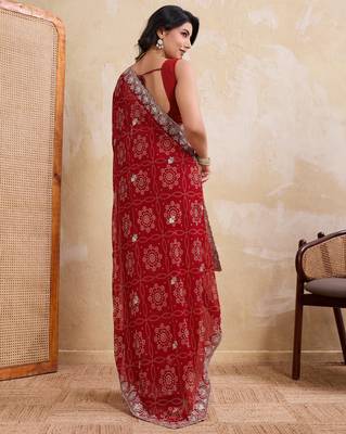 Entrancing red georgette bandhej print with cutwork lace border saree with mono banglory silk blouse 5