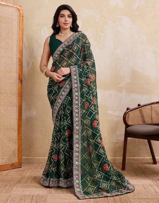 Inviting green georgette bandhej print with cutwork lace border saree with mono banglory silk blouse 1