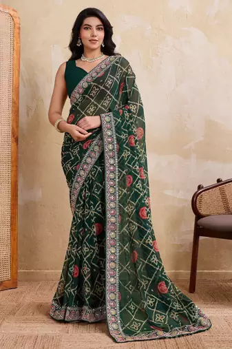 Inviting green georgette bandhej print with cutwork lace border saree with mono banglory silk blouse