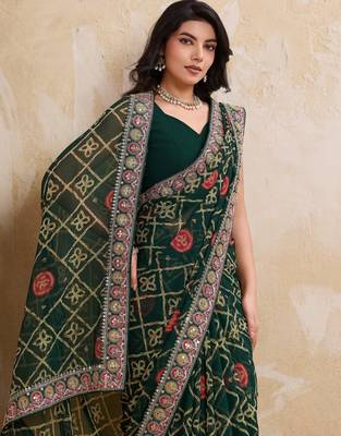 Inviting green georgette bandhej print with cutwork lace border saree with mono banglory silk blouse 2