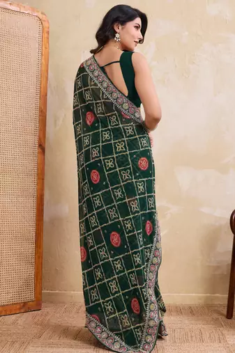 Inviting green georgette bandhej print with cutwork lace border saree with mono banglory silk blouse