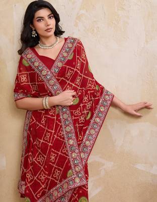 Fascinating red georgette bandhej print with cutwork lace border saree with mono banglory silk blouse 2