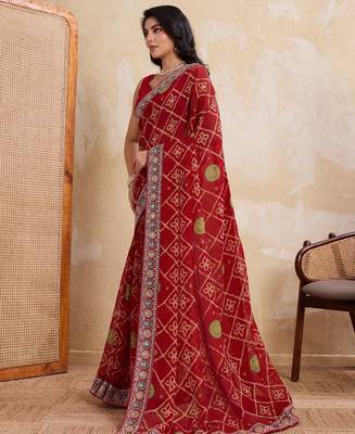 Fascinating red georgette bandhej print with cutwork lace border saree with mono banglory silk blouse 3