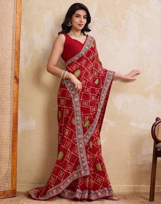 Fascinating red georgette bandhej print with cutwork lace border saree with mono banglory silk blouse 4