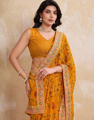 Intriguing yellow georgette bandhej print with cutwork lace border saree with mono banglory silk blouse 2