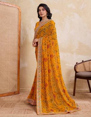 Intriguing yellow georgette bandhej print with cutwork lace border saree with mono banglory silk blouse 3