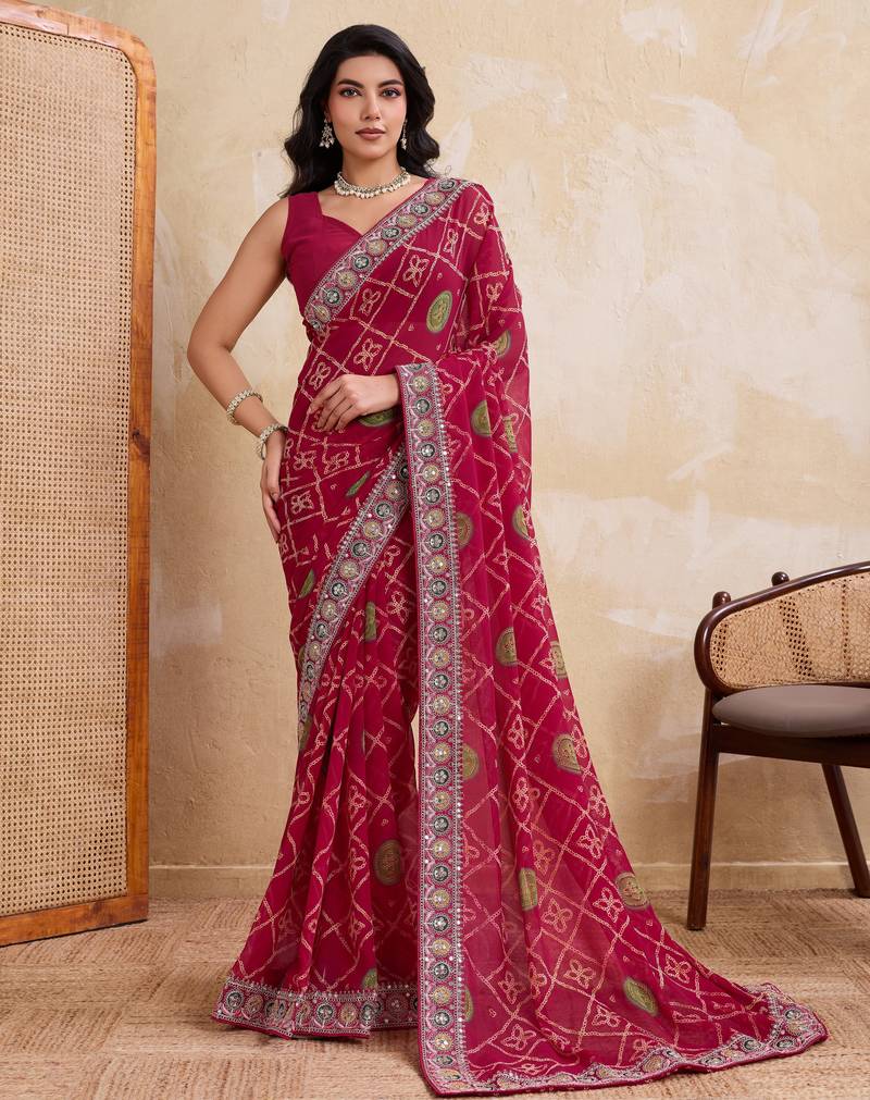 Appetizing pink georgette bandhej print with cutwork lace border saree with mono banglory silk blouse