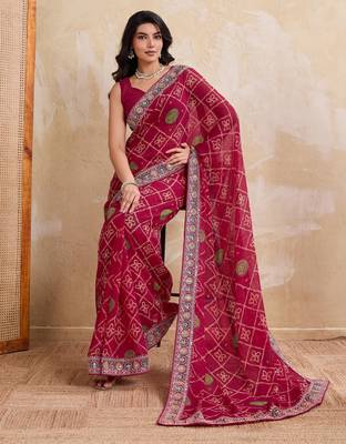 Appetizing pink georgette bandhej print with cutwork lace border saree with mono banglory silk blouse 4