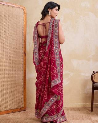 Appetizing pink georgette bandhej print with cutwork lace border saree with mono banglory silk blouse 5