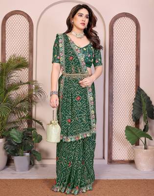 Pleasant green georgette bandhej print with cutwork lace border saree with mono banglory silk blouse 3