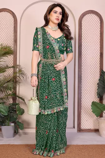 Pleasant green georgette bandhej print with cutwork lace border saree with mono banglory silk blouse