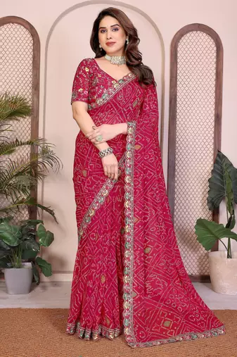 Agreeable pink georgette bandhej print with cutwork lace border saree with mono banglory silk blouse