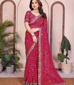 Agreeable pink georgette bandhej print with cutwork lace border saree with mono banglory silk blouse