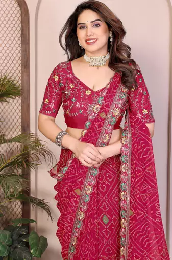 Agreeable pink georgette bandhej print with cutwork lace border saree with mono banglory silk blouse
