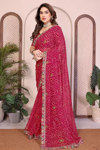 Agreeable pink georgette bandhej print with cutwork lace border saree with mono banglory silk blouse