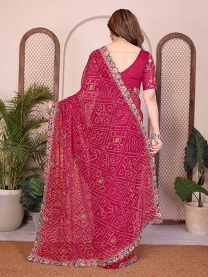 Agreeable pink georgette bandhej print with cutwork lace border saree with mono banglory silk blouse 5
