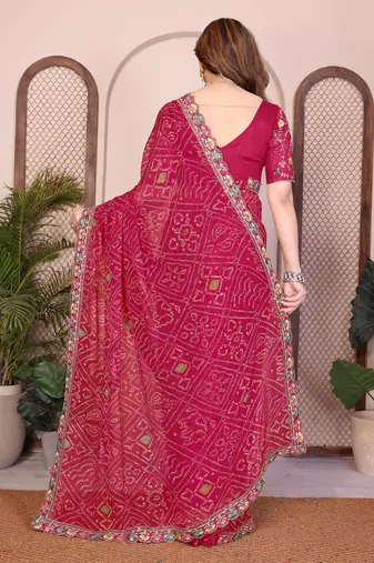 Agreeable pink georgette bandhej print with cutwork lace border saree with mono banglory silk blouse