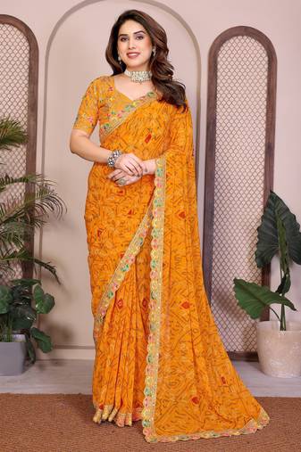 Likable yellow georgette bandhej print with cutwork lace border saree with mono banglory silk blouse
