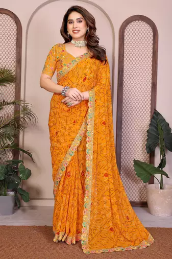 Likable yellow georgette bandhej print with cutwork lace border saree with mono banglory silk blouse