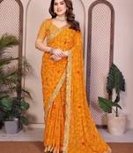 Likable yellow georgette bandhej print with cutwork lace border saree with mono banglory silk blouse