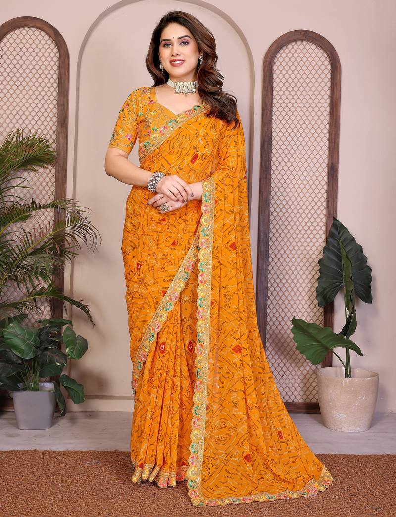 Likable yellow georgette bandhej print with cutwork lace border saree with mono banglory silk blouse