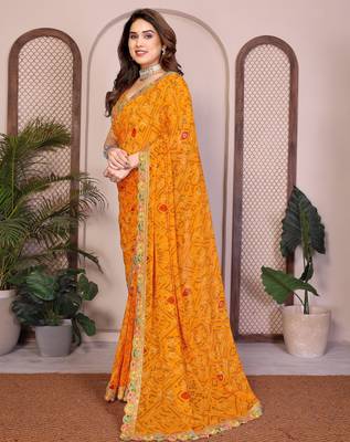 Likable yellow georgette bandhej print with cutwork lace border saree with mono banglory silk blouse 4
