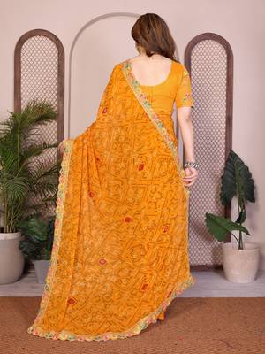 Likable yellow georgette bandhej print with cutwork lace border saree with mono banglory silk blouse 5