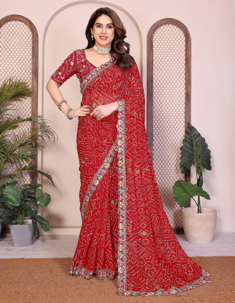 Endearing red georgette bandhej print with cutwork lace border saree with mono banglory silk blouse
