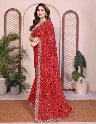 Endearing red georgette bandhej print with cutwork lace border saree with mono banglory silk blouse 4